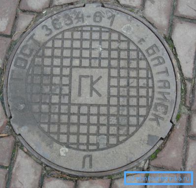 Крышка люка, выполненная из чугуна Крышка люка, выполненная из чугуна