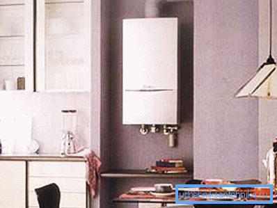 На фото – газовый отопительный котел, монтируемый на стену На фото – газовый отопительный котел, монтируемый на стену